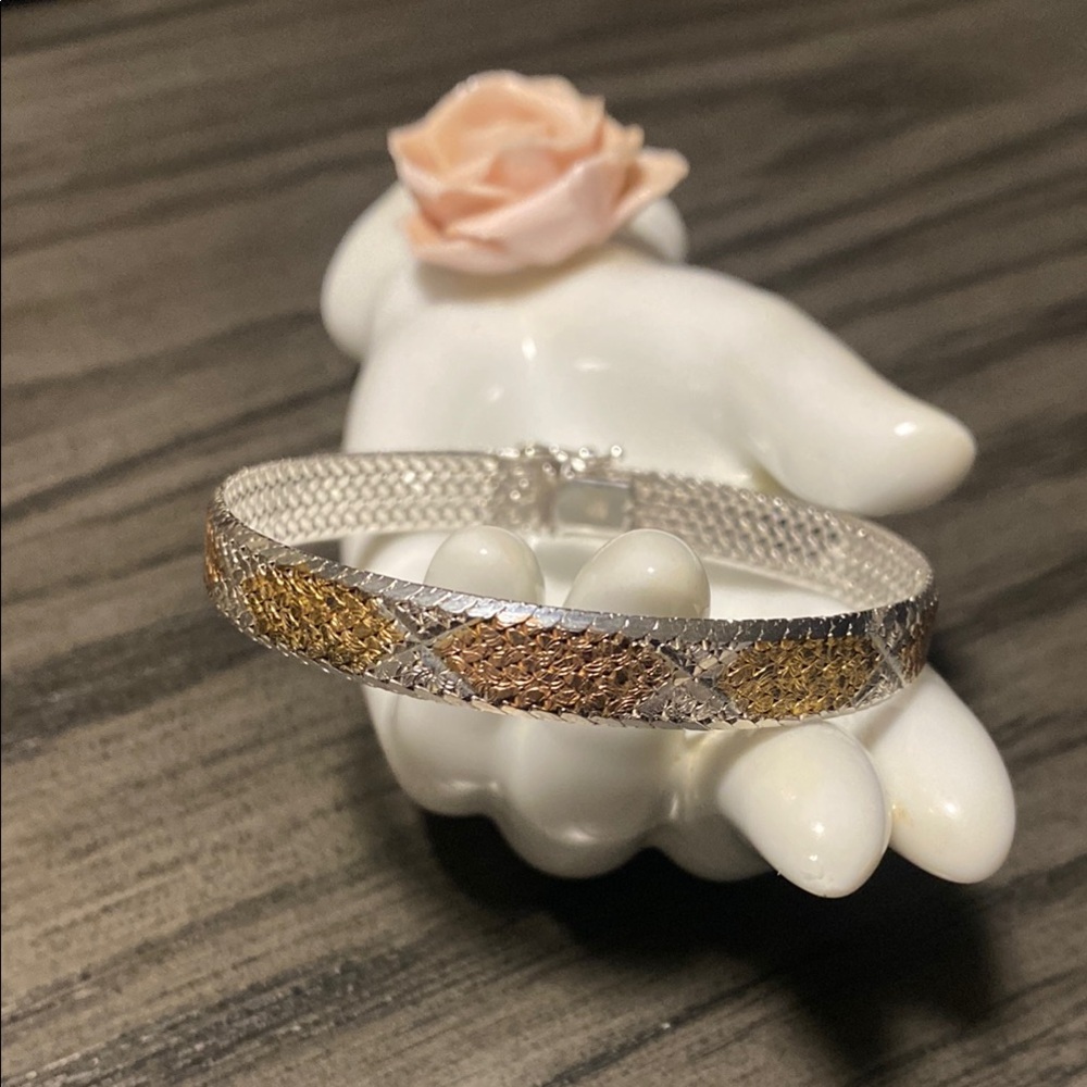 Intricate Silver and Gold Textured Bracelet